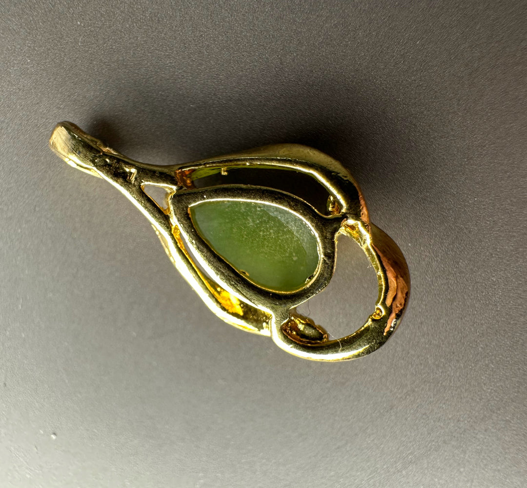 Vintage Canadian nephrite jade teardrop pendant in a gold plated setting