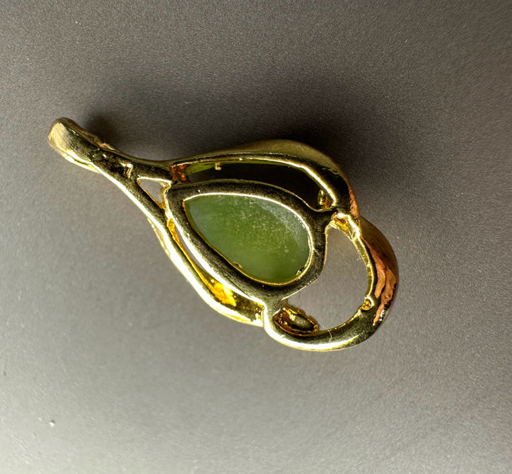 Vintage Canadian nephrite jade teardrop pendant in a gold plated setting