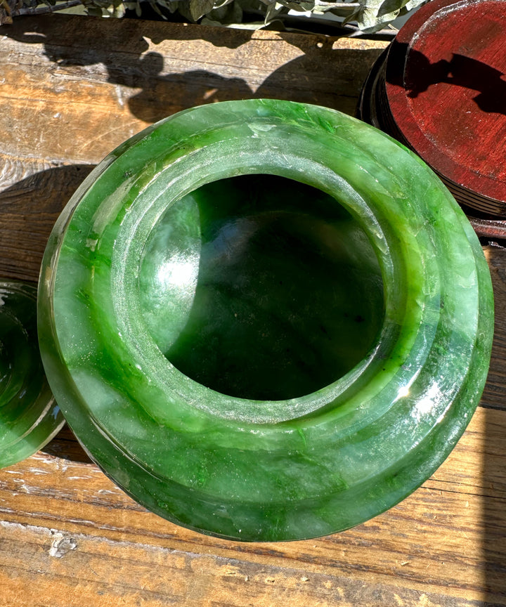 Polar Jade Pot 4.2 inch viewed from above with a wide circular opening in glossy green jade on a wooden surface.
