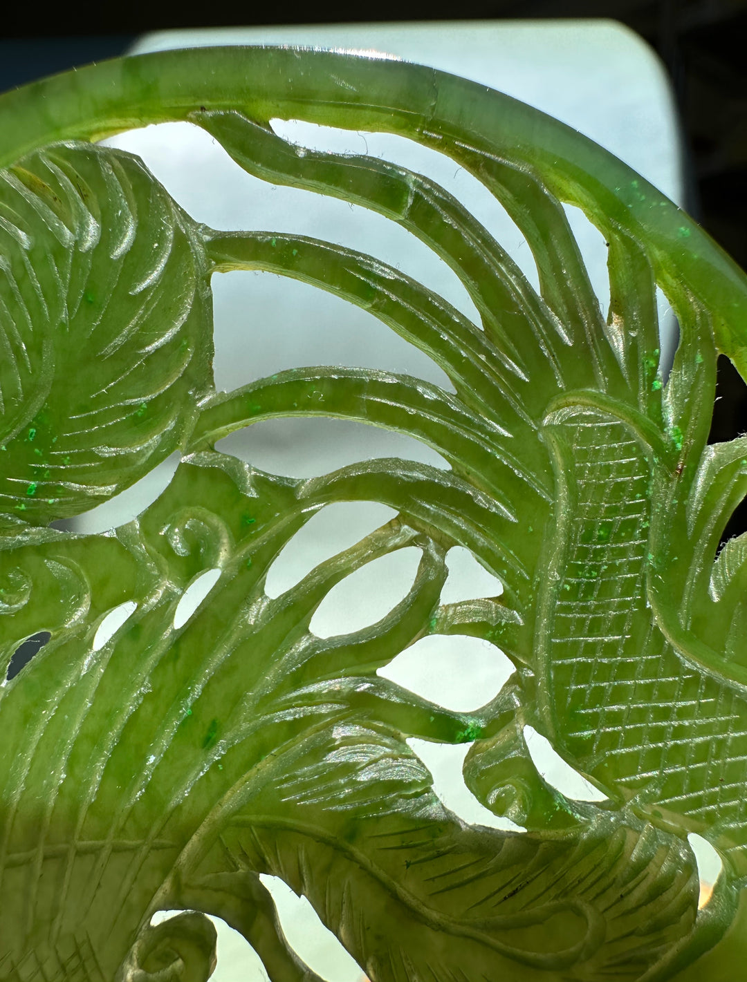 Canadian Jade Dragon and Phoenix Screen oval in green jade with dragon and phoenix motifs