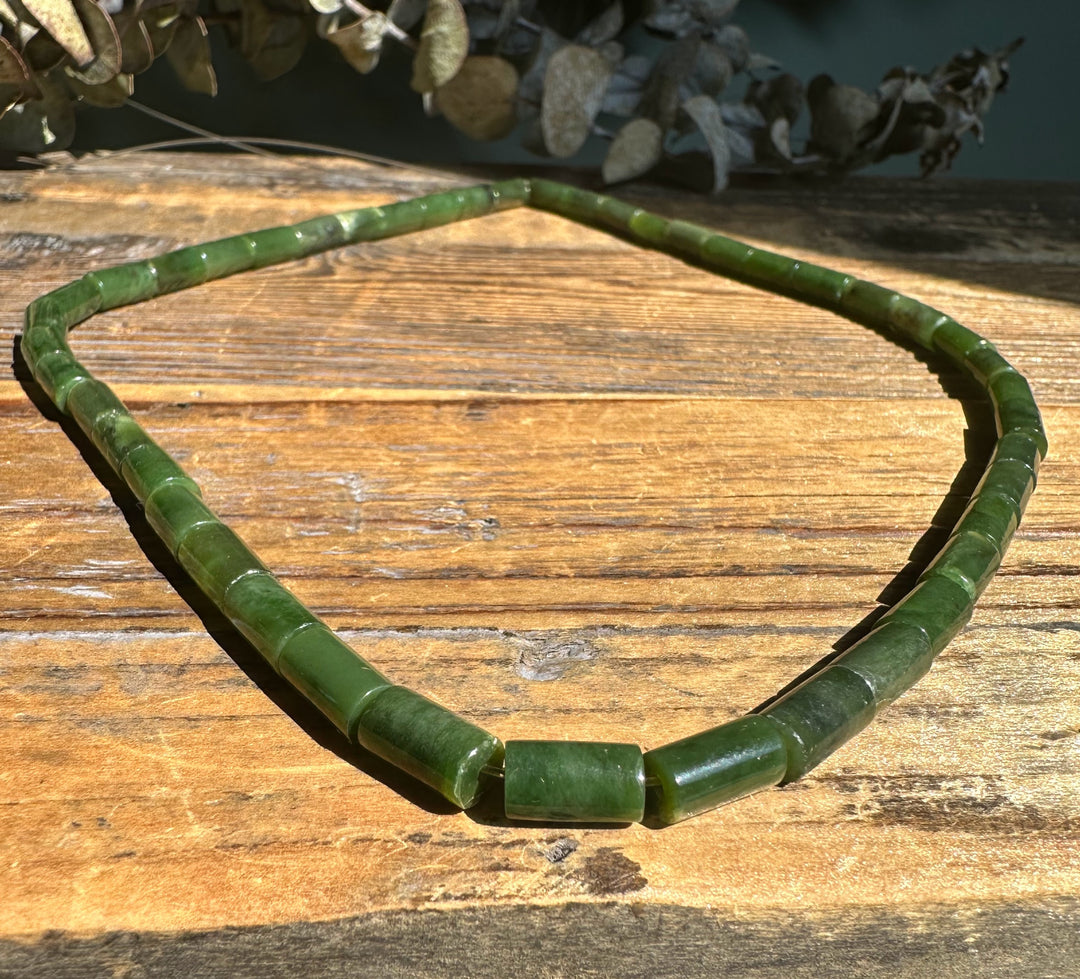 Siberian jade tube bead necklace with cylindrical green beads on an 18 inch strand.