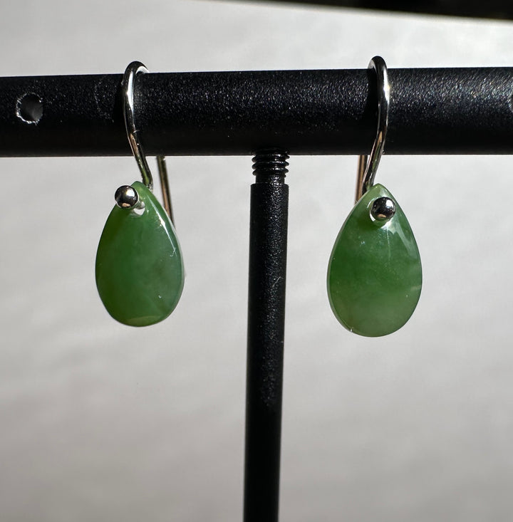 Green jade teardrop earrings on silver hooks
