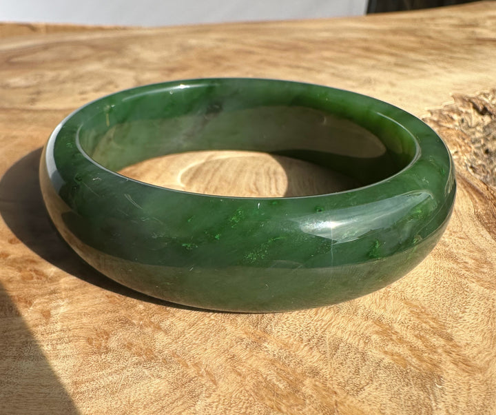 Canadian Jade Bangle in a glossy emerald green with subtle translucence