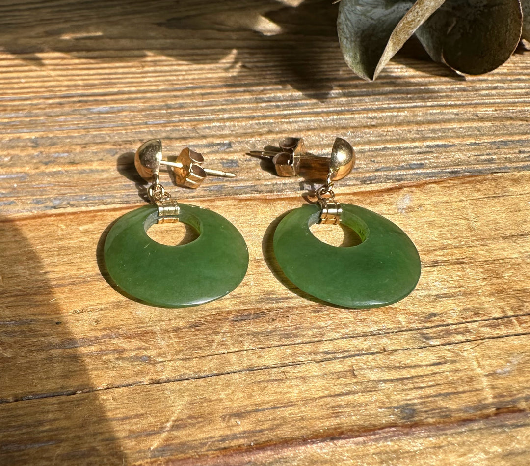 Front view of Vintage Jade Round Drop Earrings 17mm with green donut discs on gold-tone posts.