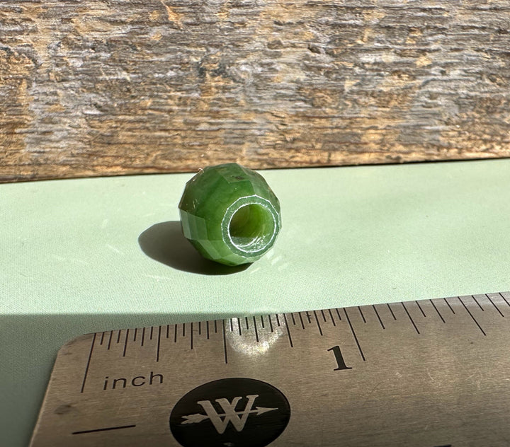 Faceted Canadian jade bead with drilled hole 14x12mm sold individually.