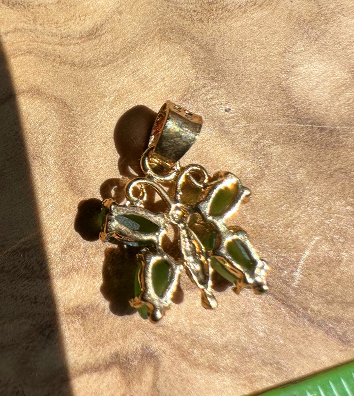 A Grade Vintage Jade Butterfly Pendant with green stones in a gold setting