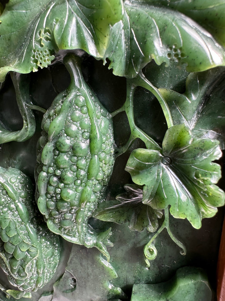 Close-up of jade green cabbage leaf from a hand carved Jade Chinese Cabbage Screen with detailed leaf texture.