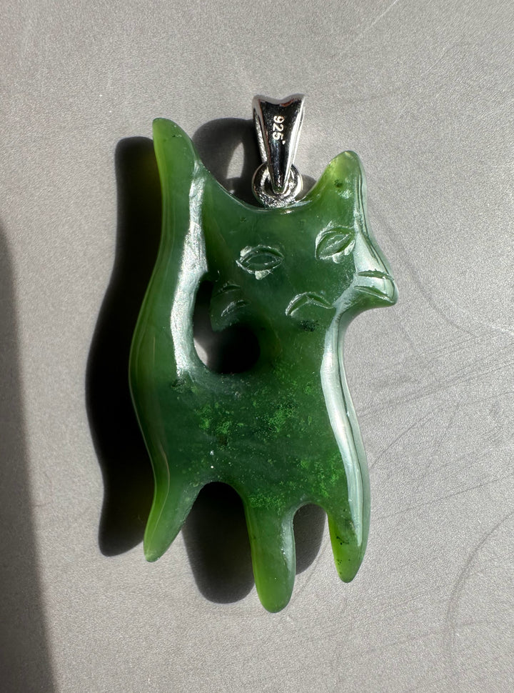 Grumpy Canadian Jade Cat Pendant on a silver chain with 925 stamped bail visible