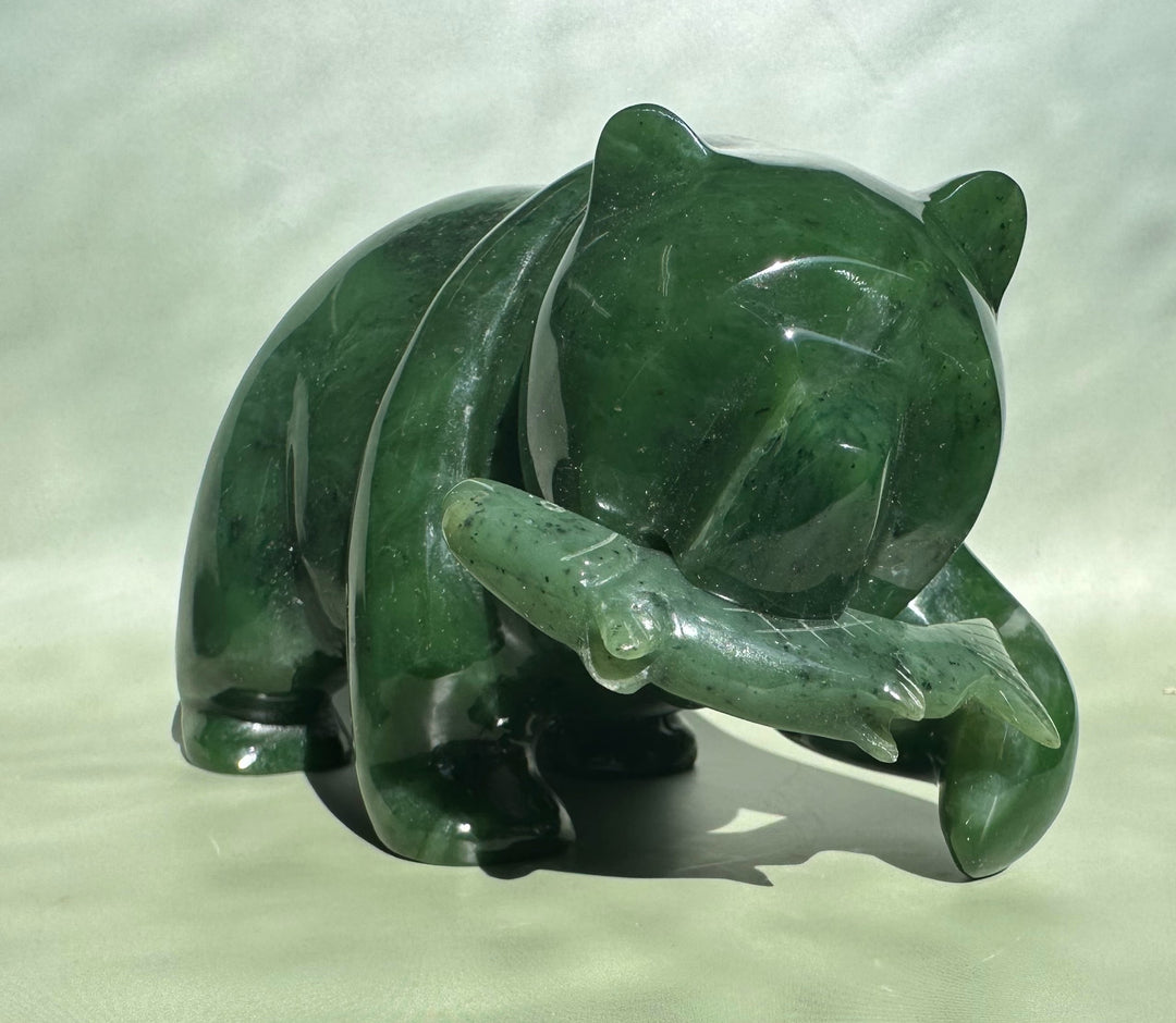 Crouching 6-inch Canadian jade bear sculpture in glossy green.