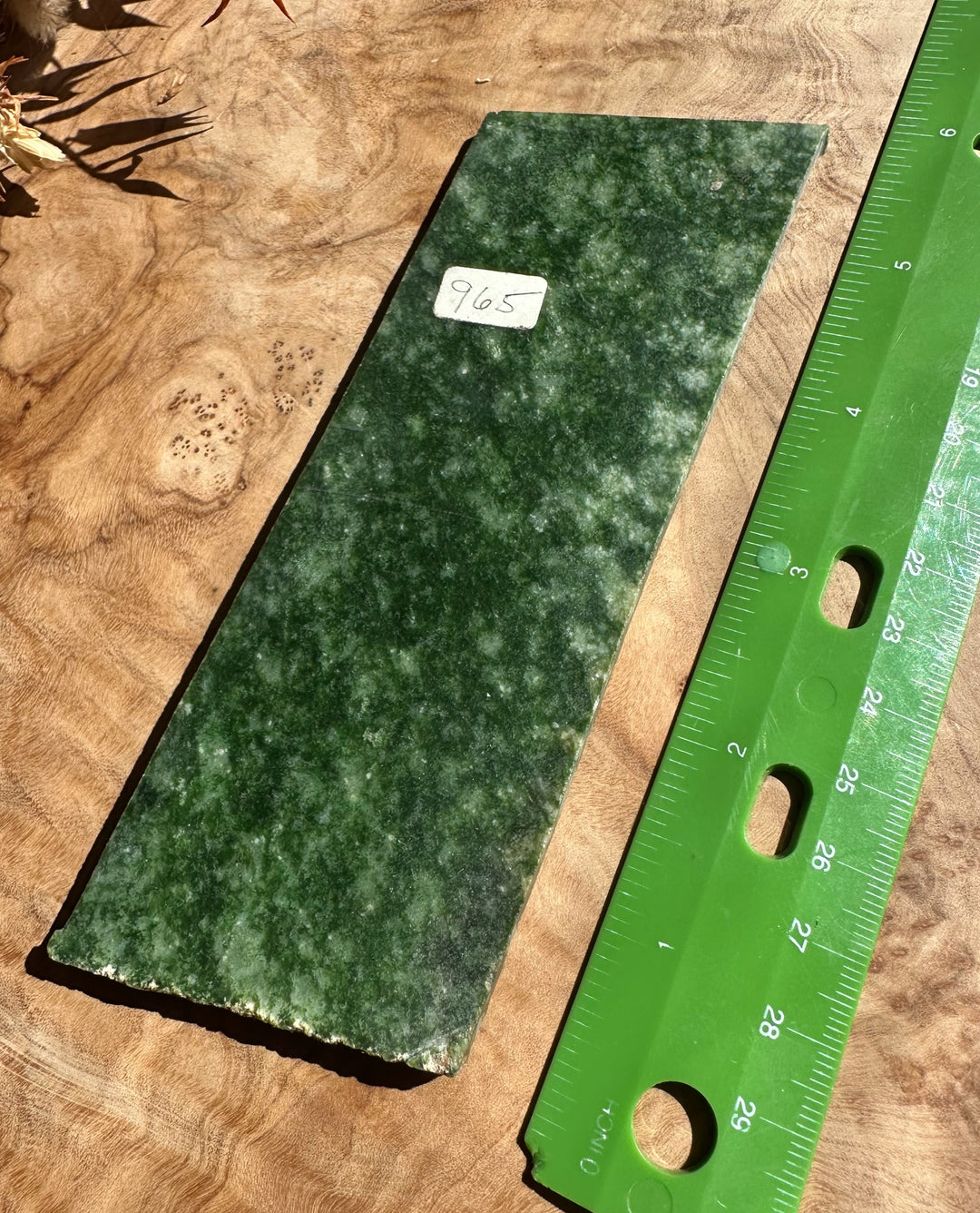 Wyoming Snowflake Jade Slab 95g shown with a green ruler beside it for scale