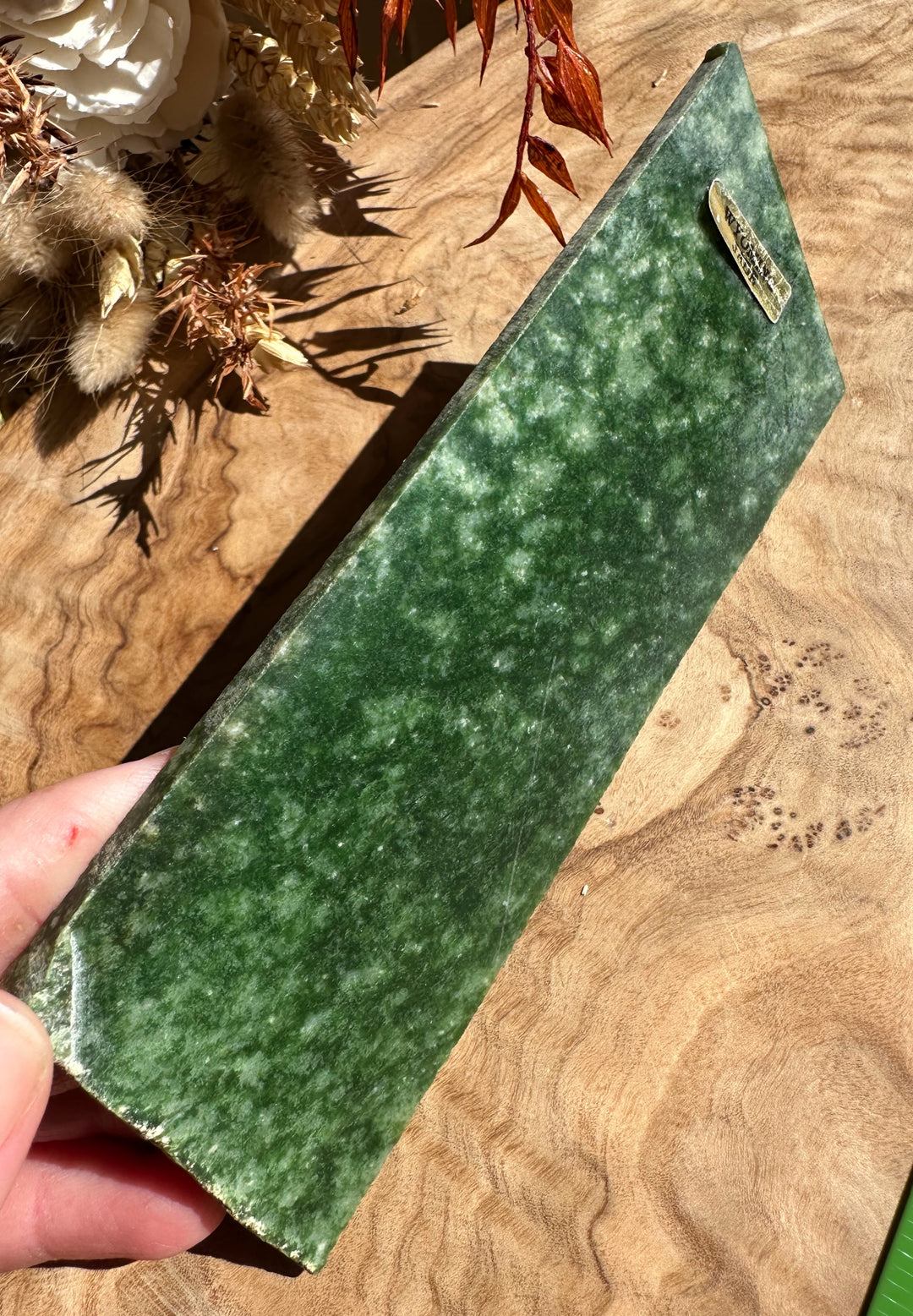 Wyoming Snowflake Jade Slab 95g angled view showing dark green with lighter mottling