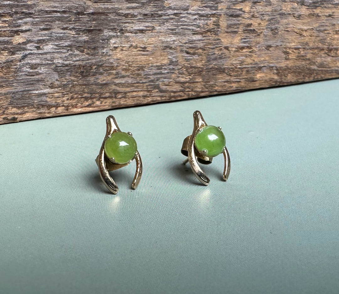Vintage jade wishbone earrings with round green jade stones in silver settings