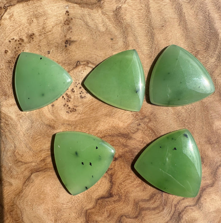 Apple Green Siberian Jade Cabochons 25x25mm  on wood surface
