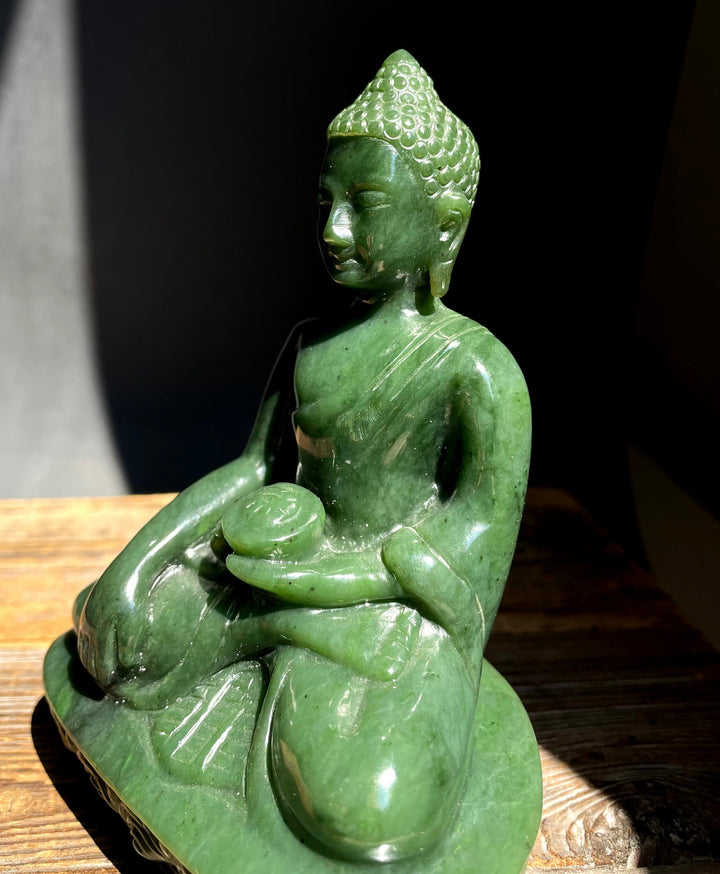 5 inch Canadian nephrite jade Buddha seated in meditation on a carved base