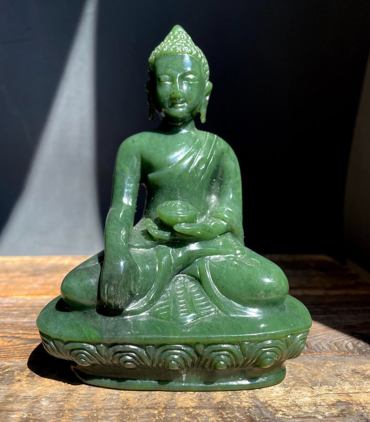 Green Jade Buddha statue seated with bowl carved from Canadian nephrite jade.