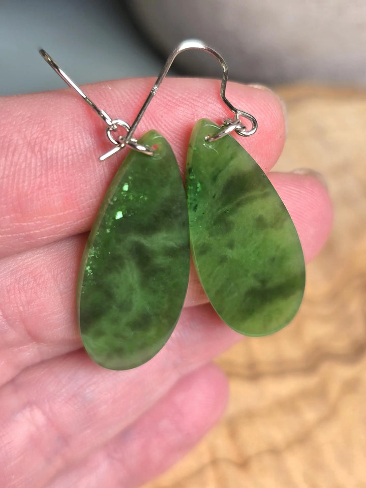 Green jade teardrop earrings with silver hooks