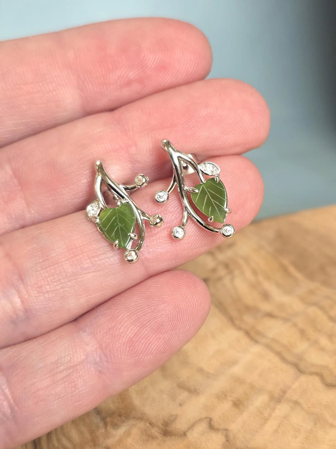 Canadian Jade Leaf and Silver Earrings with green leaf charms and curling silver vines
