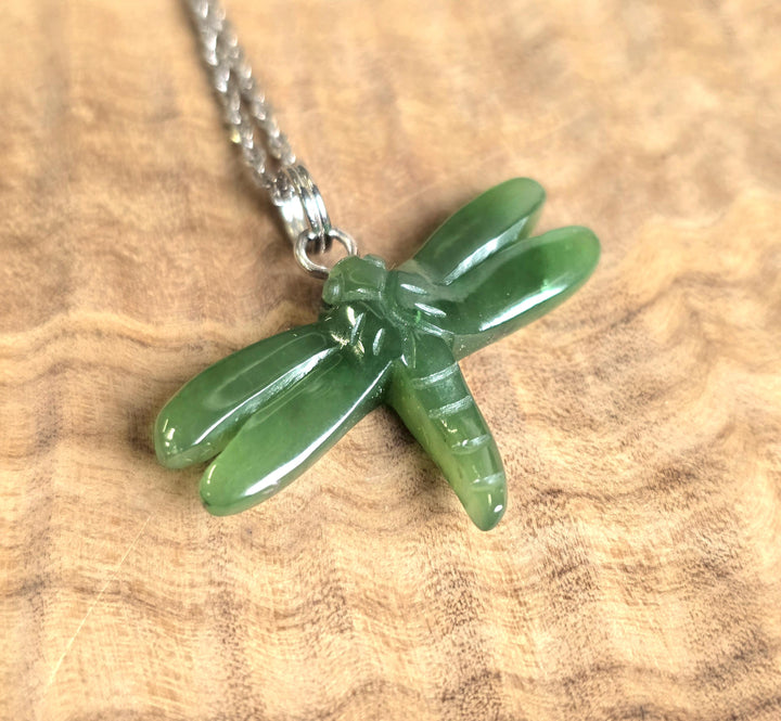 Green jade dragonfly pendant on a silver chain