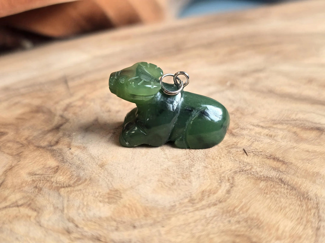 Canadian nephrite jade water buffalo charm with ring loop for necklace side view