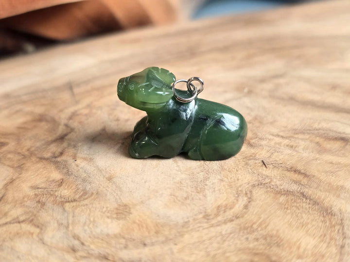 Canadian nephrite jade water buffalo charm with ring loop for necklace side view