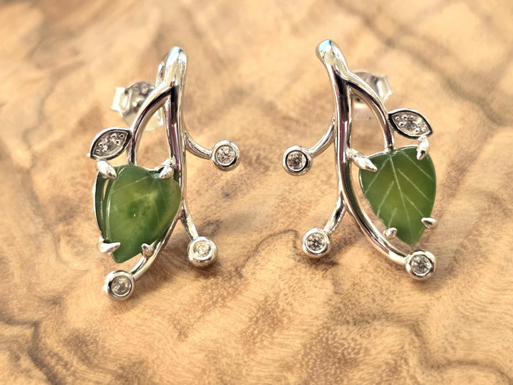 Canadian Jade Leaf and Silver Earrings featuring a green jade leaf pendant set in a silver vine with crystal accents.