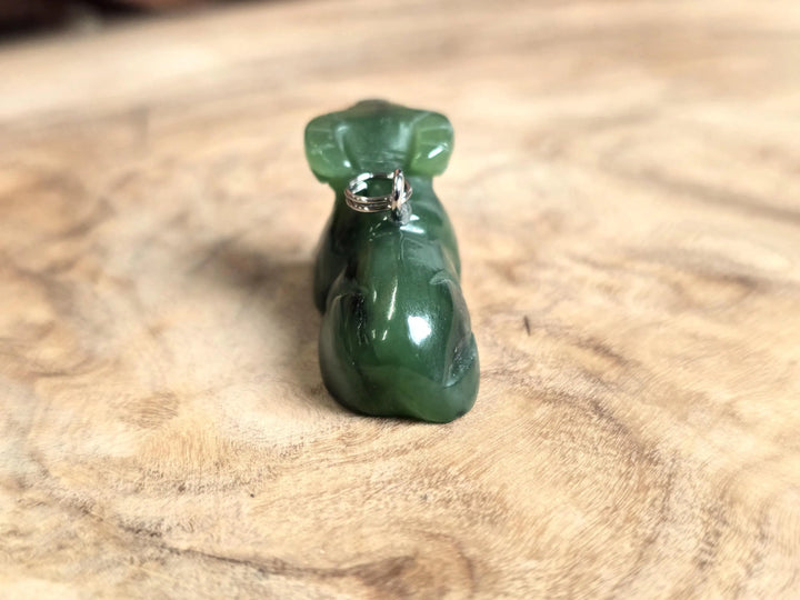 Dark green nephrite jade water buffalo charm with a metal loop bail on top