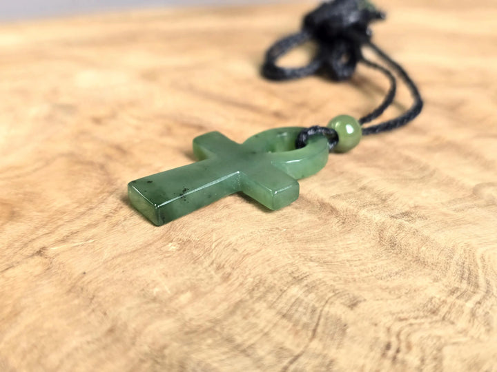 Close up of Canadian nephrite jade Ankh pendant 22x34mm on black cord with bead