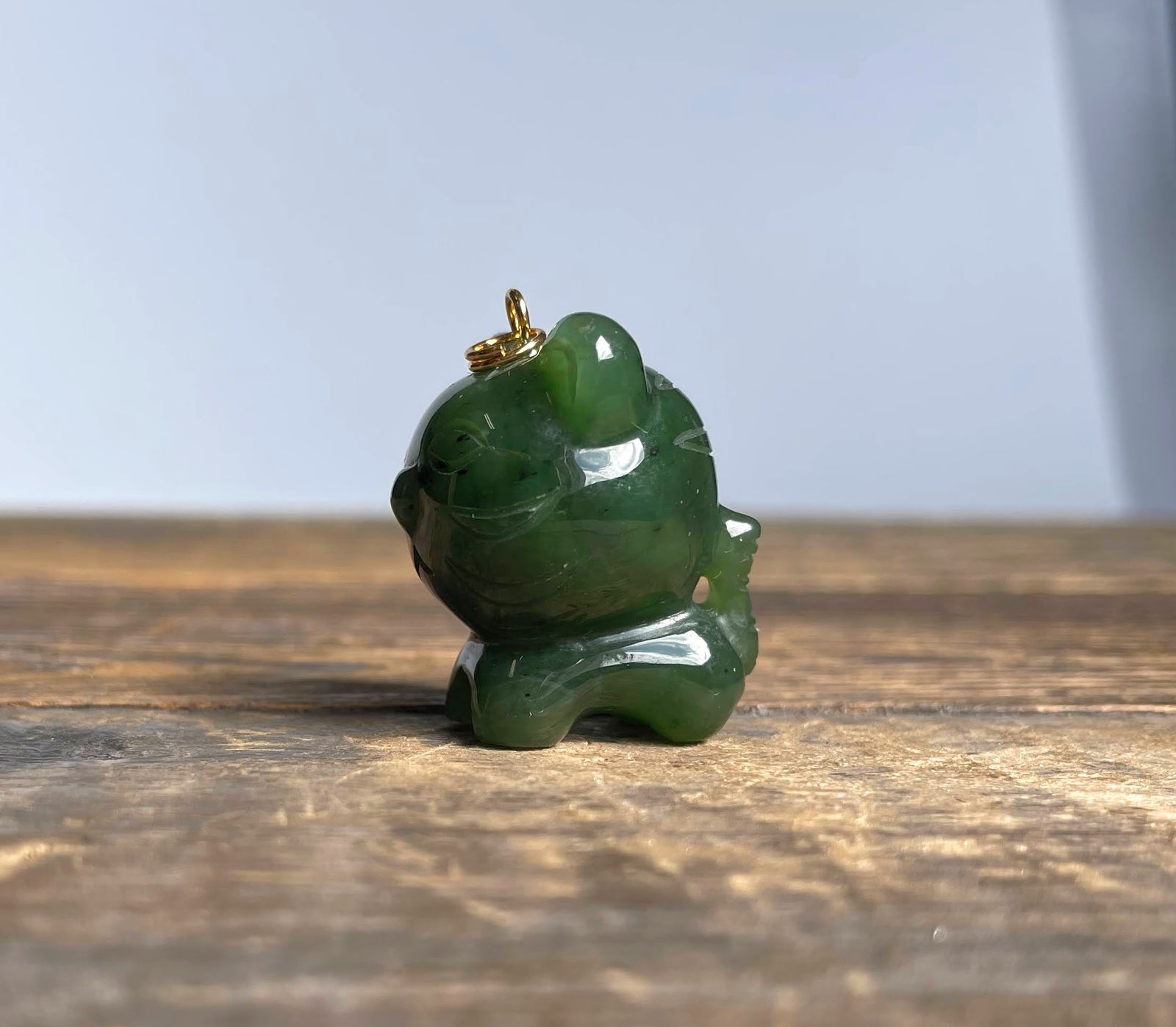 Cartoon Jade Tiger Charm 1 inch side view with a gold loop on top