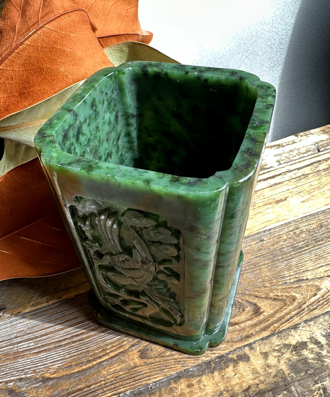 River Jade Vase Pen Holder in green jade featuring an intricate carved floral panel on its side