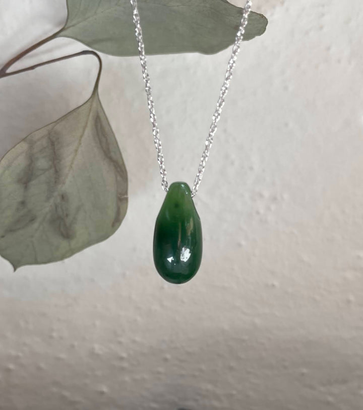 Dark green Canadian Jade 20mm teardrop pendant on a silver chain.