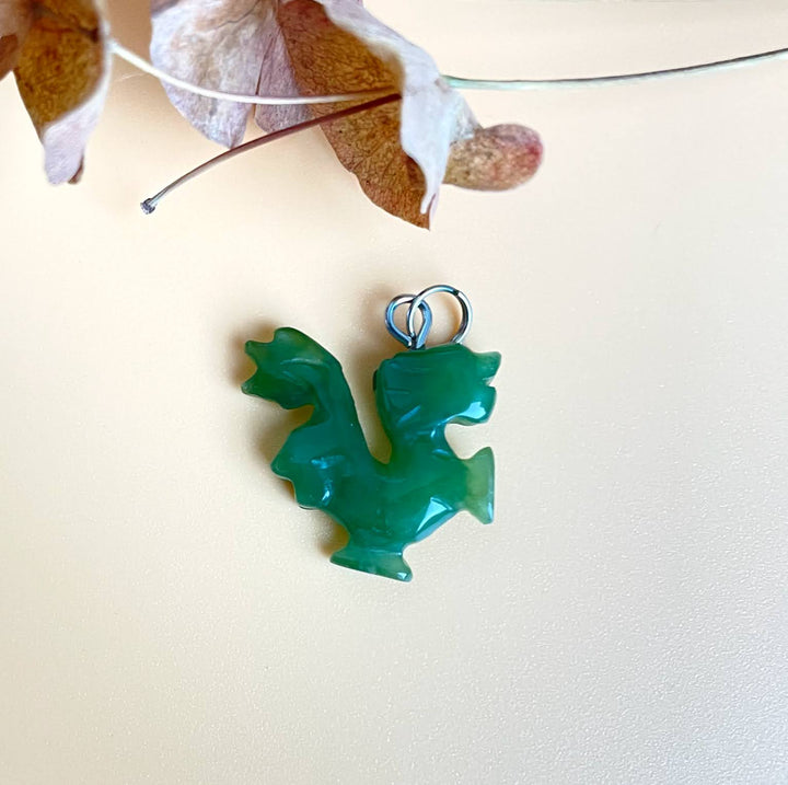 Green dragon walking charm pendant with a silver loop for necklace