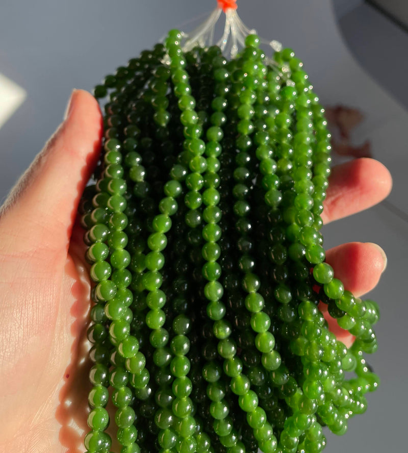 A Grade 5mm Nephrite Jade Beads, unstrung 16"