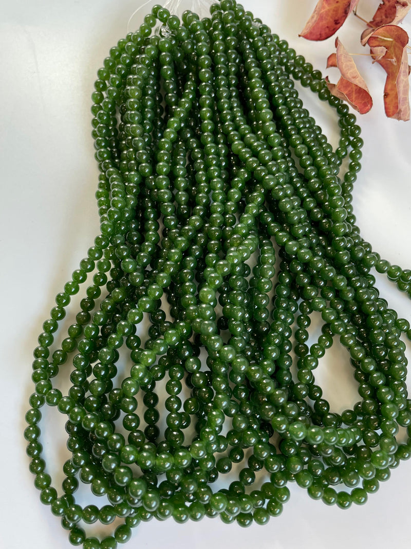 A Grade 5mm Nephrite Jade Beads, unstrung 16"