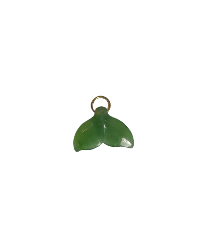 Single green whale tail charm with a small gold loop on a white background.