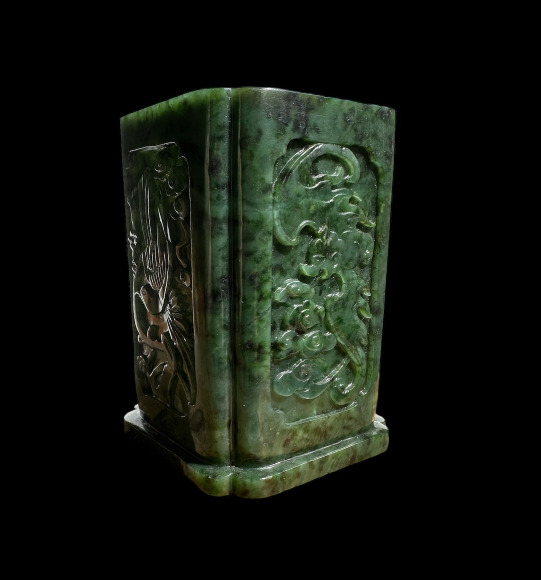 Green jade vase pen holder featuring a detailed floral tree relief on a rectangular block and base
