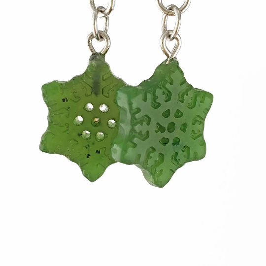 Green jade snowflake earrings about 15mm wide on silver ear wires