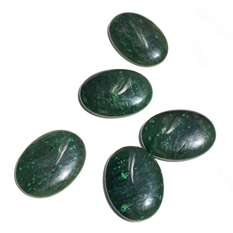 Five dark green oval Cassiar jade cabochons 30x22mm