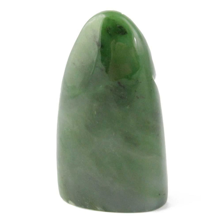 Tall green Polar Jade carved sculpture with a rounded base and pointed top.