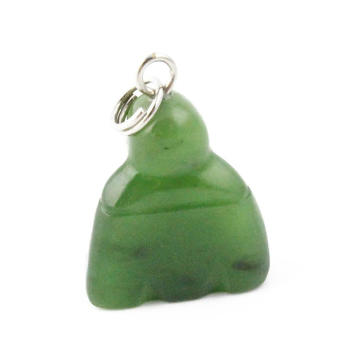 Green jade Buddha pendant with metal loop on white background