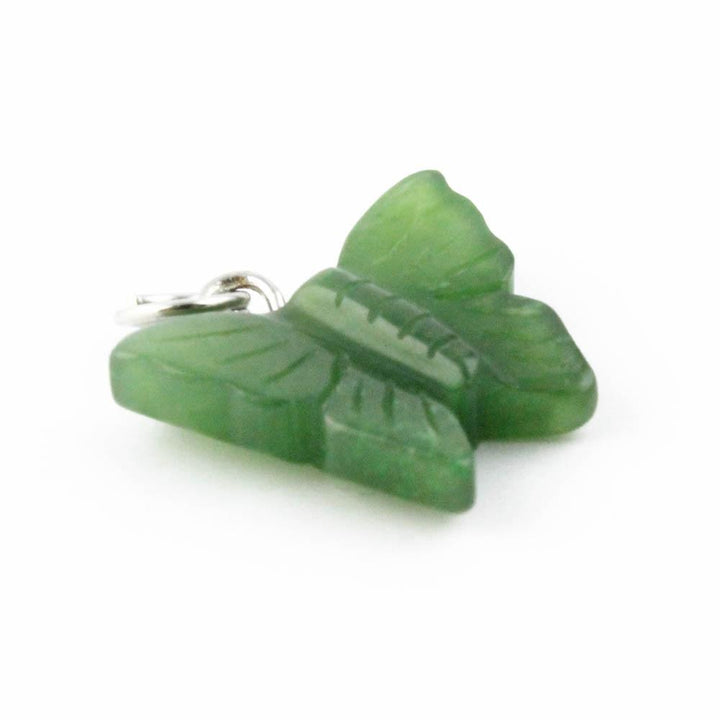Green butterfly jade charm attached to a silver jump ring