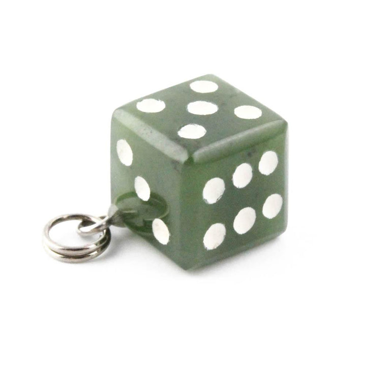 Green dice charm with white pips and a silver metal loop for attaching.
