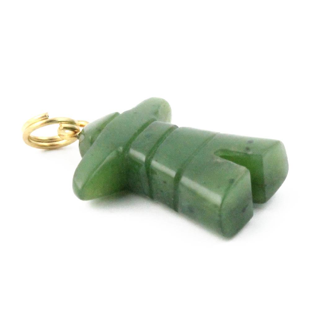 Side view of green stone inuksuk pendant with a gold loop