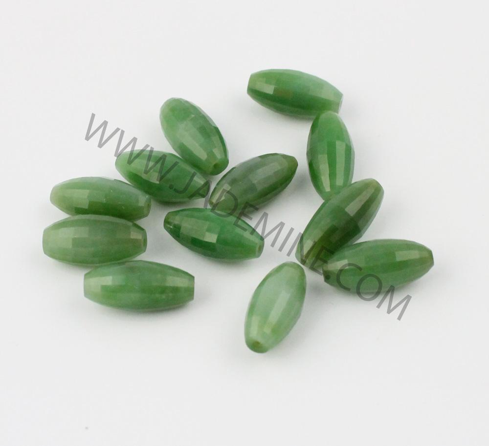 A Grade faceted Siberian Beads 9x18mm pale green beads arranged on white background