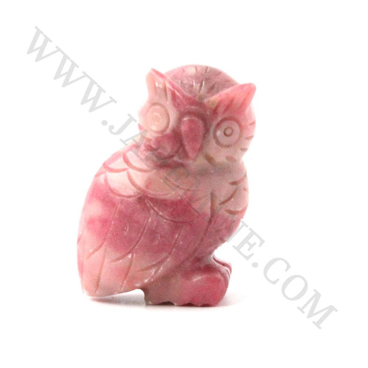 Pink rhodonite carved owl figurine with detailed feather patterns