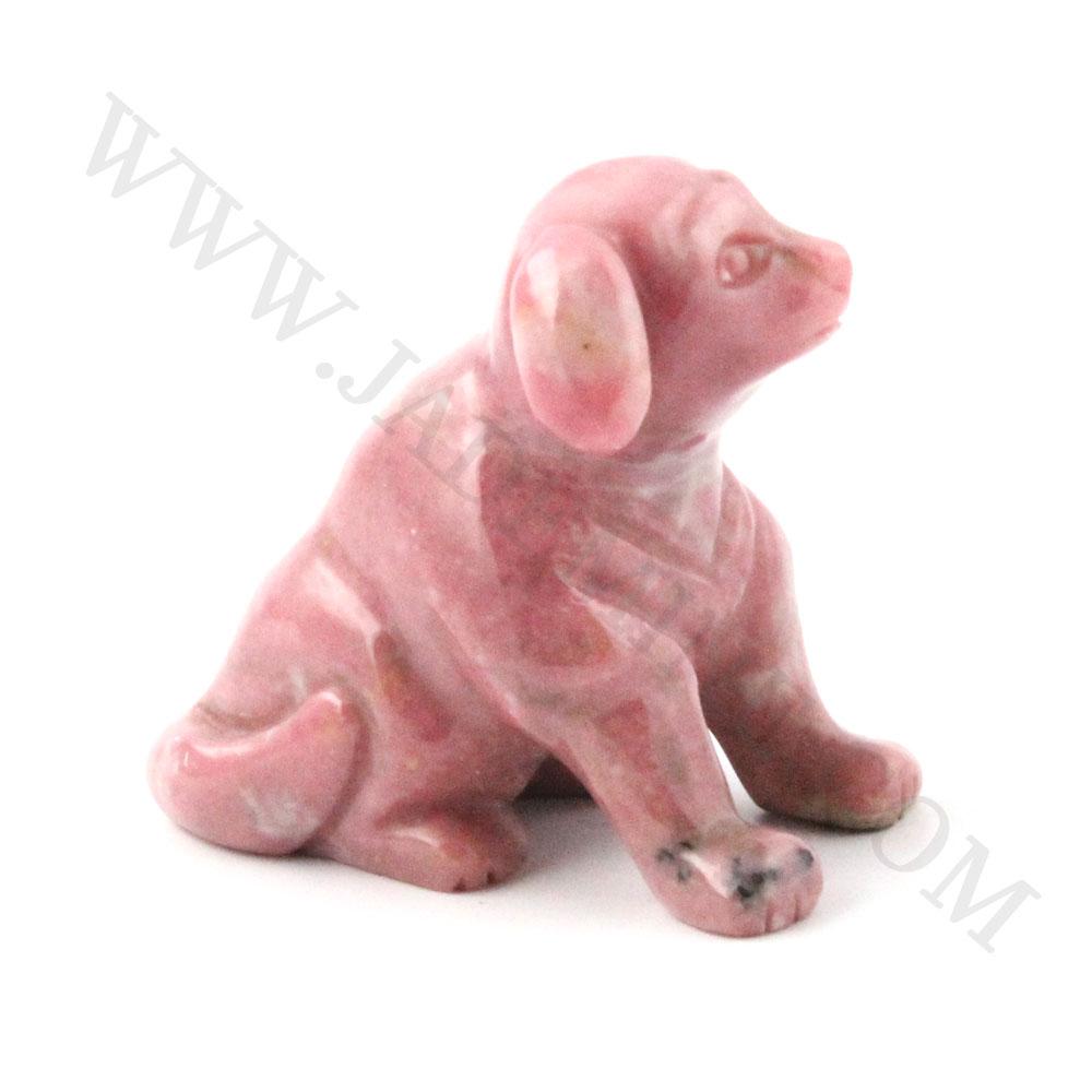 Polished pink rhodonite pig figurine in a seated pose