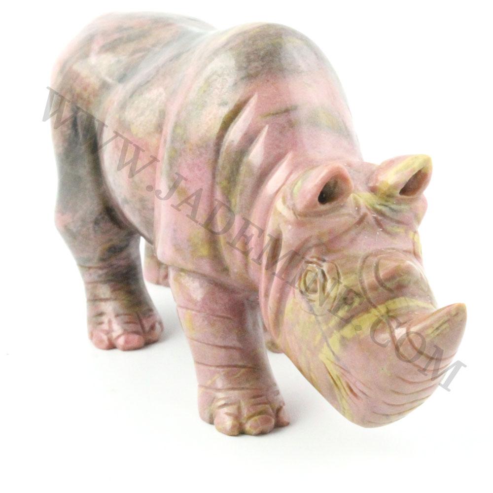 5 inch Rhodonite rhinoceros sculpture shown from the front with pink marbled tones.