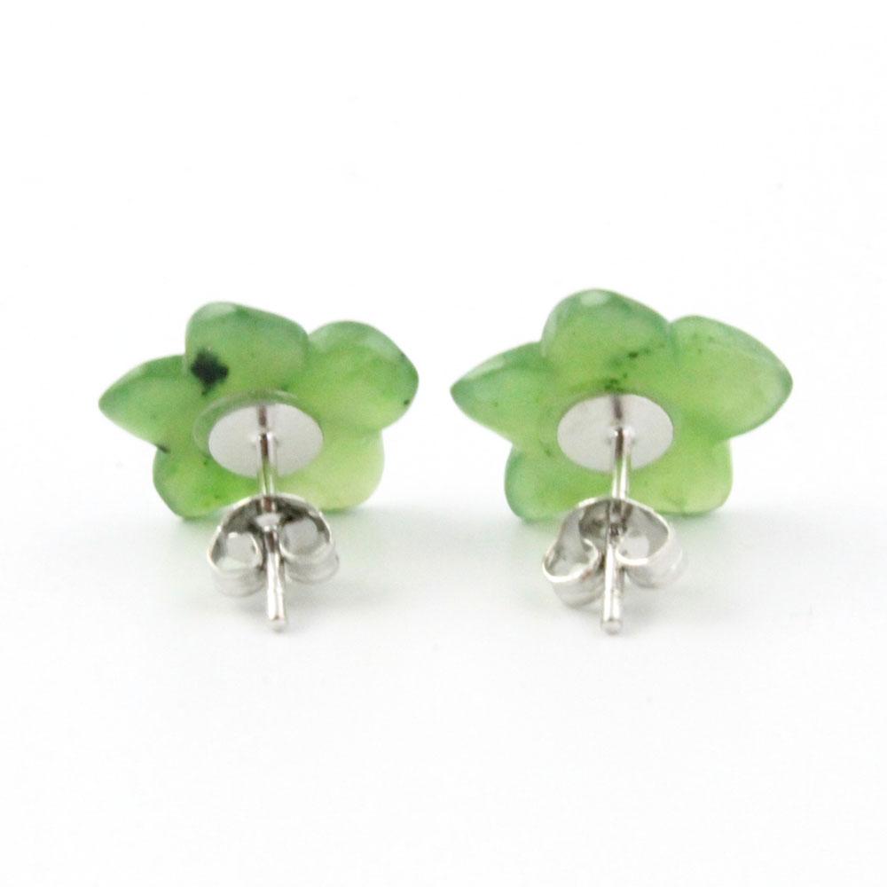 Green jade flower stud earrings with silver posts on a white background