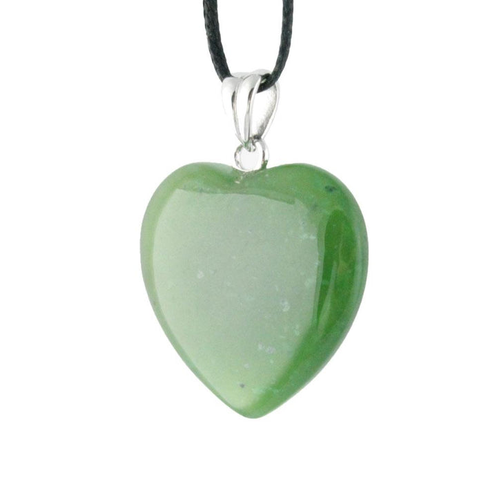 Green heart shaped pendant on black cord with a silver bail
