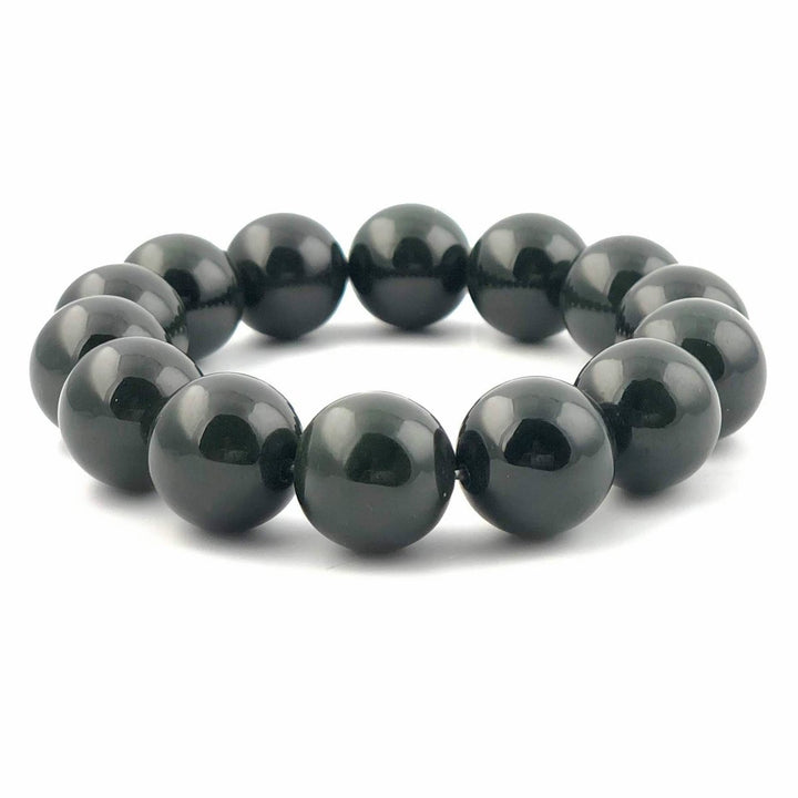 Dark green glossy 16mm bead bracelet arranged in a circular shape.