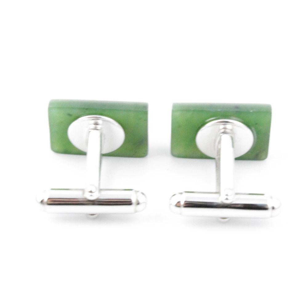 Back view of jade cufflinks with square green fronts and silver stems with ball end fasteners.